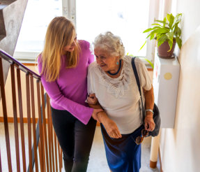 young woman assessing the elderly