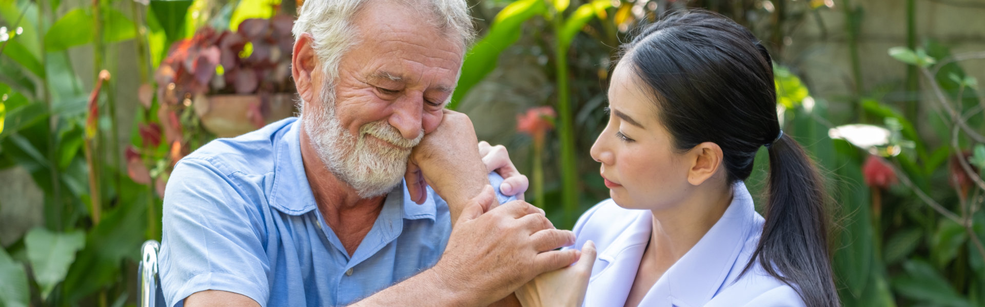 caregiver take care elderly man at home